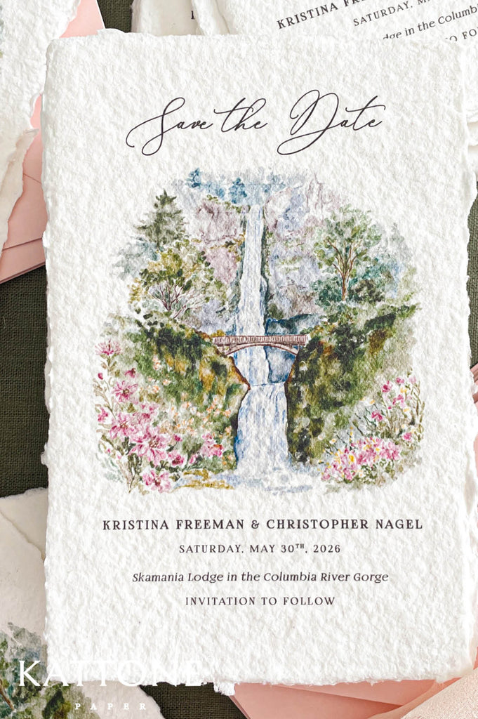 Custom watercolor venue illustration of waterfall, river gorge, trees and pink florals printed on textured handmade cotton paper save the date card with deckled edges.