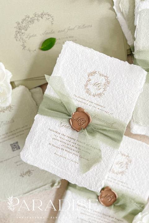 This exquisite wedding invitations suite offers a blend of natural elegance and modern romance. Perfect for a green summer wedding, these invitations are printed on luxurious handmade paper, which provides a rich, tactile feel. The elegant modern calligraphy design adds a touch of contemporary sophistication, setting a fresh and heartfelt tone for your special day.
