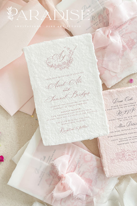 Announce your special day with the effortless, romantic charm of these handmade paper wedding invitations. Crafted for a boho wedding, this suite captures the free-spirited beauty of the season. Each invite is printed on soft and luxurious cotton paper, providing a unique, tactile experience for your guests. The light, airy design and premium paper are the perfect combination for a memorable summer wedding.
