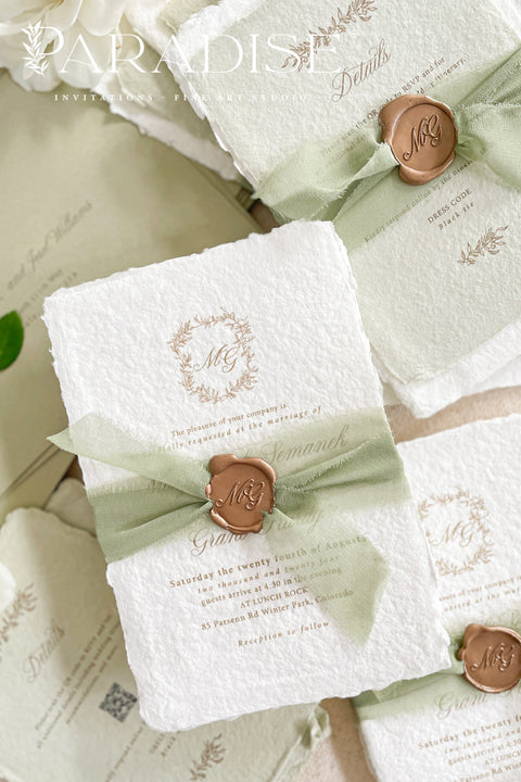 This exquisite wedding invitations suite offers a blend of natural elegance and modern romance. Perfect for a green summer wedding, these invitations are printed on luxurious handmade paper, which provides a rich, tactile feel. The elegant modern calligraphy design adds a touch of contemporary sophistication, setting a fresh and heartfelt tone for your special day.
