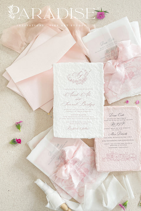 Announce your special day with the effortless, romantic charm of these handmade paper wedding invitations. Crafted for a boho wedding, this suite captures the free-spirited beauty of the season. Each invite is printed on soft and luxurious cotton paper, providing a unique, tactile experience for your guests. The light, airy design and premium paper are the perfect combination for a memorable summer wedding.