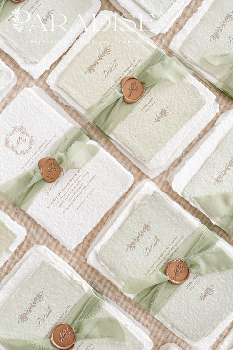 This exquisite wedding invitations suite offers a blend of natural elegance and modern romance. Perfect for a green summer wedding, these invitations are printed on luxurious handmade paper, which provides a rich, tactile feel. The elegant modern calligraphy design adds a touch of contemporary sophistication, setting a fresh and heartfelt tone for your special day.