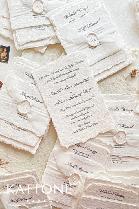 Timeless, refined, and elegantly understated - these handmade paper wedding invitations embody the essence of fine art craftsmanship. Printed on luxury cotton handmade paper with naturally deckled edges, each invitation feels soft, organic, and beautifully textured, creating a sense of warmth and authenticity from the very first touch. Each suite is wrapped in a silk ribbon and finished with wax seal monogram, adding a bespoke touch that symbolizes intimacy and attention to detail.