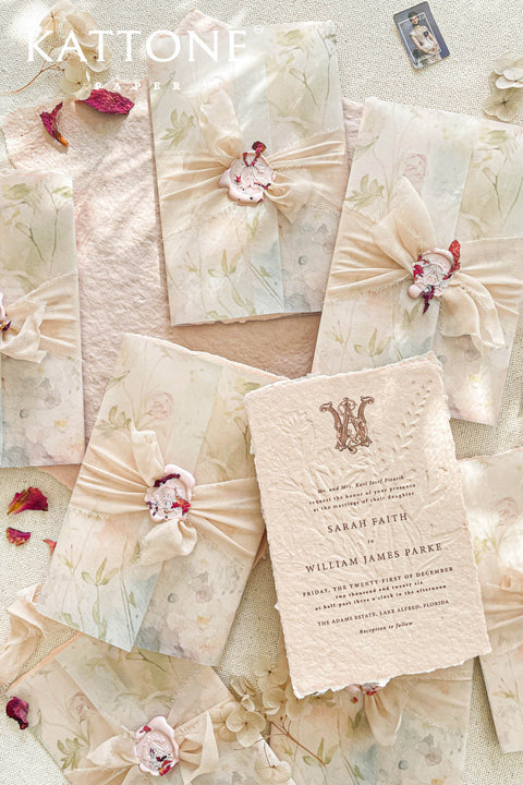 Announce your special day with understated elegance and a luxurious, tactile finish. These exquisite wedding invites combine the refined art of blind embossing with the organic beauty of natural deckle edge paper, creating a truly memorable experience for your guests. Perfect for a garden wedding, an outdoor celebration, or any couple who appreciates fine craftsmanship and minimalist design. The lack of ink on the embossing highlights the paper's texture and craftsmanship.