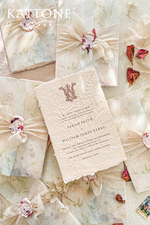 Announce your special day with understated elegance and a luxurious, tactile finish. These exquisite wedding invites combine the refined art of blind embossing with the organic beauty of natural deckle edge paper, creating a truly memorable experience for your guests. Perfect for a garden wedding, an outdoor celebration, or any couple who appreciates fine craftsmanship and minimalist design. The lack of ink on the embossing highlights the paper's texture and craftsmanship.