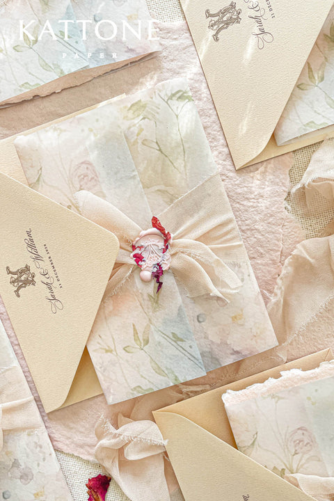 Announce your special day with understated elegance and a luxurious, tactile finish. These exquisite wedding invites combine the refined art of blind embossing with the organic beauty of natural deckle edge paper, creating a truly memorable experience for your guests. Perfect for a garden wedding, an outdoor celebration, or any couple who appreciates fine craftsmanship and minimalist design. The lack of ink on the embossing highlights the paper's texture and craftsmanship.