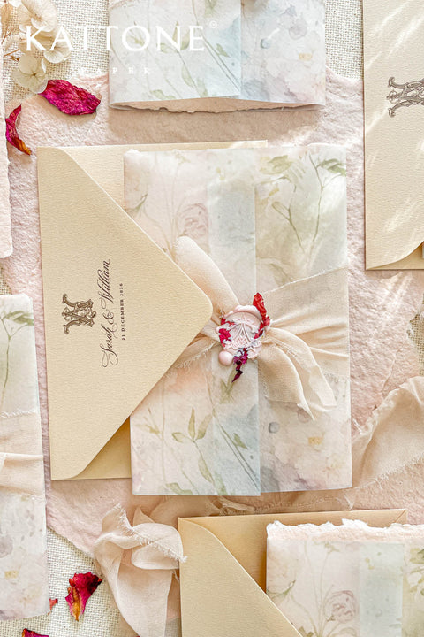 Announce your special day with understated elegance and a luxurious, tactile finish. These exquisite wedding invites combine the refined art of blind embossing with the organic beauty of natural deckle edge paper, creating a truly memorable experience for your guests. Perfect for a garden wedding, an outdoor celebration, or any couple who appreciates fine craftsmanship and minimalist design. The lack of ink on the embossing highlights the paper's texture and craftsmanship.