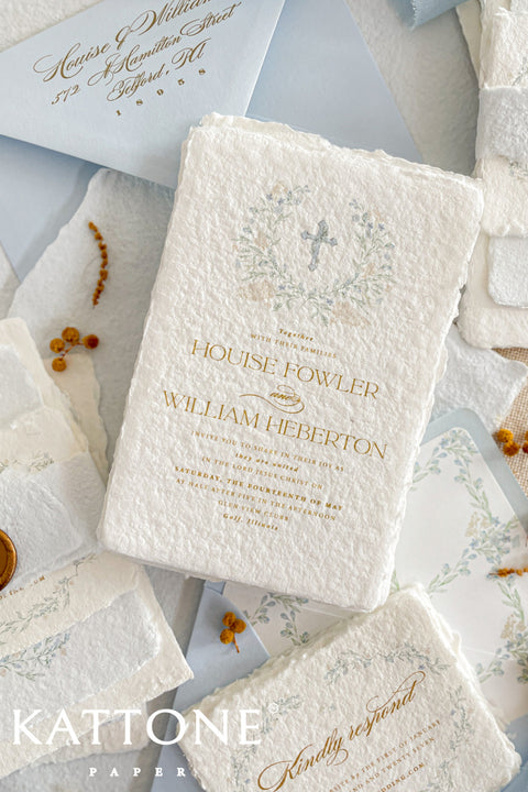A serene and faith-inspired christening invitation crafted from luxurious handmade paper and adorned with soft watercolor botanicals. Featuring a delicate floral wreath and subtle Christian cross, this design blends timeless elegance with gentle color and refined typography. Perfect for baptisms and church ceremonies, it offers a meaningful keepsake that beautifully honors this sacred milestone.