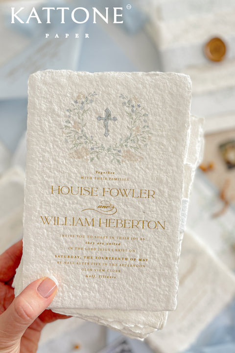 A serene and faith-inspired christening invitation crafted from luxurious handmade paper and adorned with soft watercolor botanicals. Featuring a delicate floral wreath and subtle Christian cross, this design blends timeless elegance with gentle color and refined typography. Perfect for baptisms and church ceremonies, it offers a meaningful keepsake that beautifully honors this sacred milestone.
