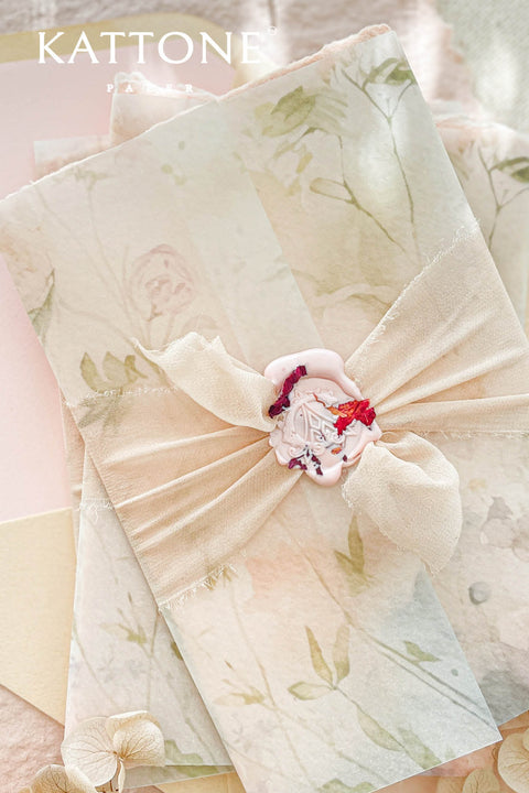 Announce your special day with understated elegance and a luxurious, tactile finish. These exquisite wedding invites combine the refined art of blind embossing with the organic beauty of natural deckle edge paper, creating a truly memorable experience for your guests. Perfect for a garden wedding, an outdoor celebration, or any couple who appreciates fine craftsmanship and minimalist design. The lack of ink on the embossing highlights the paper's texture and craftsmanship.