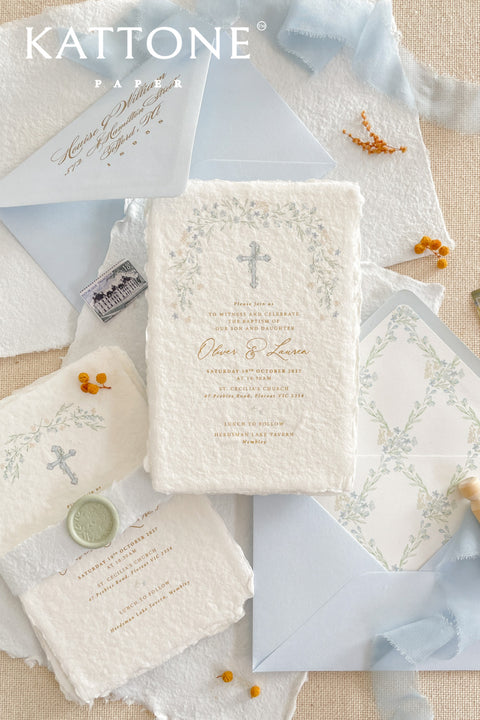 A serene and faith-inspired christening invitation crafted from luxurious handmade paper and adorned with soft watercolor botanicals. Featuring a delicate floral wreath and subtle Christian cross, this design blends timeless elegance with gentle color and refined typography. Perfect for baptisms and church ceremonies, it offers a meaningful keepsake that beautifully honors this sacred milestone.