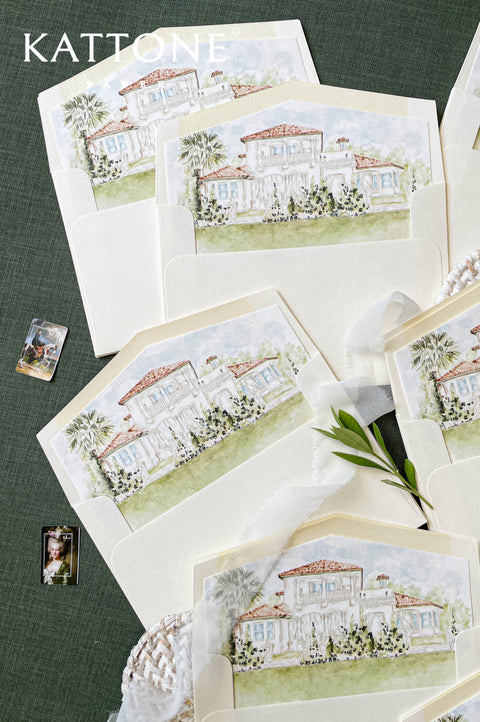 Close-up of textured ivory wedding envelope with bespoke watercolor venue liner, delicate architectural illustration, soft pastel colors, fine art stationery details.
