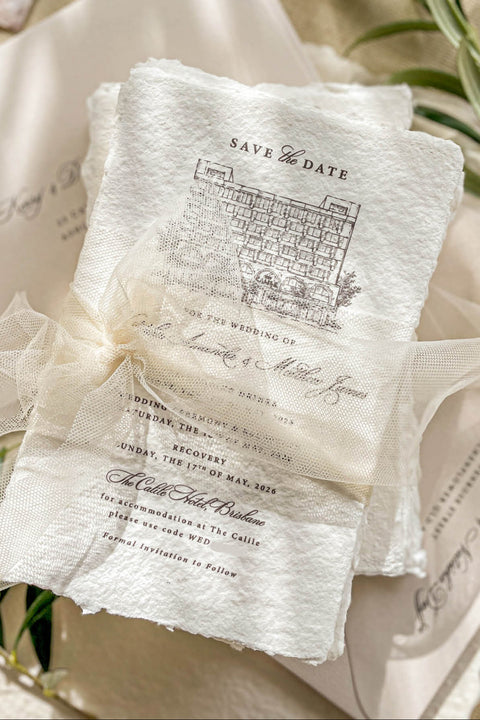 Announce your special day in timeless style with our handmade paper Save the Date cards, featuring a fine line illustration of your wedding venue. Each card is printed on luxurious 100% cotton handmade paper with natural deckled edges, wrapped in a sheer tulle ribbon for a soft, romantic finish. Perfect for fine art weddings, vineyard celebrations, or destination events.