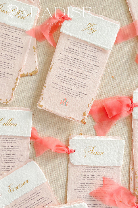 Bring a burst of color and elegance to your table setting with our colored handmade paper wedding menus, crafted from luxurious 100% cotton rag paper. These exquisite menus feature soft blush-pink tones, deckled edges, and gold foil calligraphy, creating a romantic and elevated aesthetic for any celebration. Each menu is finished with a vibrant coral silk ribbon and personalized name tag, combining artistry and function by doubling as both a menu and a place card. 