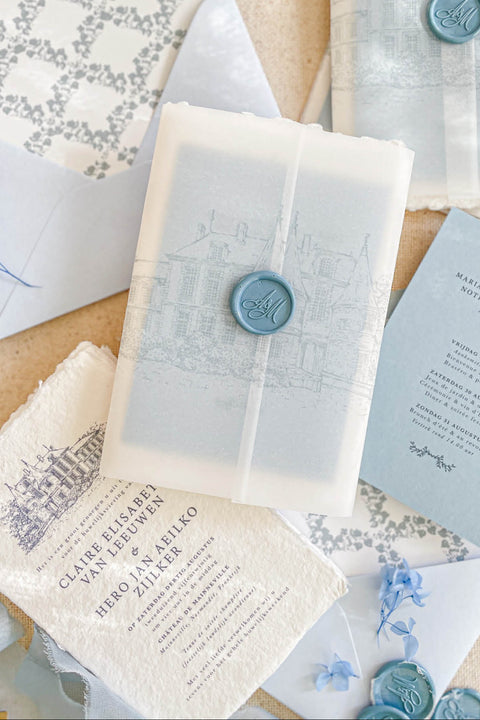 Announce your special day with the serene and natural beauty of these handmade paper wedding invitations. Perfect for a garden wedding or an outdoor celebration, this suite combines the luxurious, tactile feel of artisan paper with a delicate botanical design. The result is a truly romantic set of wedding stationery that will enchant your guests and beautifully set the tone for your special day.