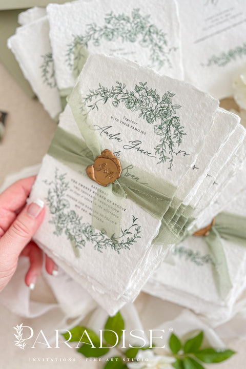 Celebrate your love surrounded by nature’s beauty with our handmade greenery wedding invitations, a perfect blend of botanical artistry and timeless craftsmanship. Each invitation is handcrafted with care and adorned with elegant watercolor leaves, lush greenery, and delicate floral accents -evoking the freshness and serenity of a garden in bloom. Perfect for botanical, garden, rustic, or modern minimalist weddings.