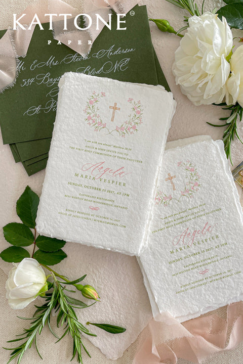 A timeless christening invitation crafted from luxurious handmade paper and adorned with a delicate watercolor floral wreath and Christian cross. Soft pastel tones and refined typography create a graceful, faith-centered design that beautifully honors this sacred milestone. Perfect for baptisms, first holy communions, and church ceremonies, this invitation becomes a meaningful keepsake for generations to come.