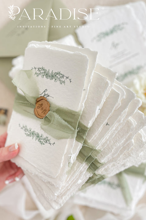 Celebrate your love surrounded by nature’s beauty with our handmade greenery wedding invitations, a perfect blend of botanical artistry and timeless craftsmanship. Each invitation is handcrafted with care and adorned with elegant watercolor leaves, lush greenery, and delicate floral accents -evoking the freshness and serenity of a garden in bloom. Perfect for botanical, garden, rustic, or modern minimalist weddings.