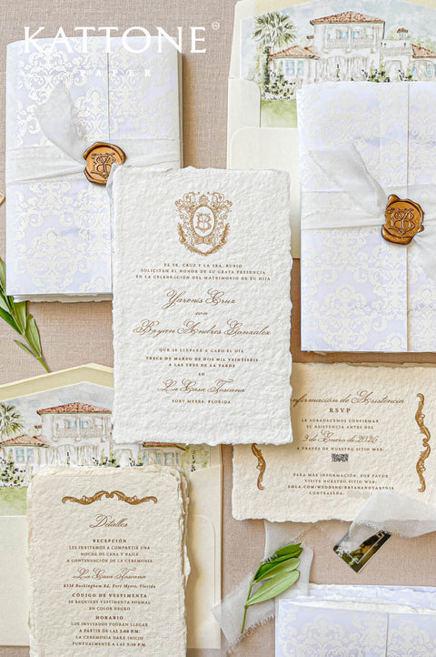Fine art handmade paper wedding invitation suite with crest monogram, wax seal, watercolor liners, and classic European styling.