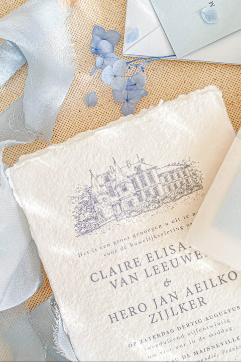 Announce your special day with the serene and natural beauty of these handmade paper wedding invitations. Perfect for a garden wedding or an outdoor celebration, this suite combines the luxurious, tactile feel of artisan paper with a delicate botanical design. The result is a truly romantic set of wedding stationery that will enchant your guests and beautifully set the tone for your special day.