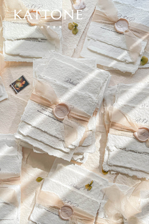 This exquisite handmade paper invitations suite offers a blend of fine artistry and personal romance. Each invitation is a true work of art, featuring a custom, hand drawn wedding venue illustration that beautifully captures the unique charm of your location. The luxurious, textured paper and timeless design create a truly romantic wedding stationery set that will be cherished by your guests long after your special day.