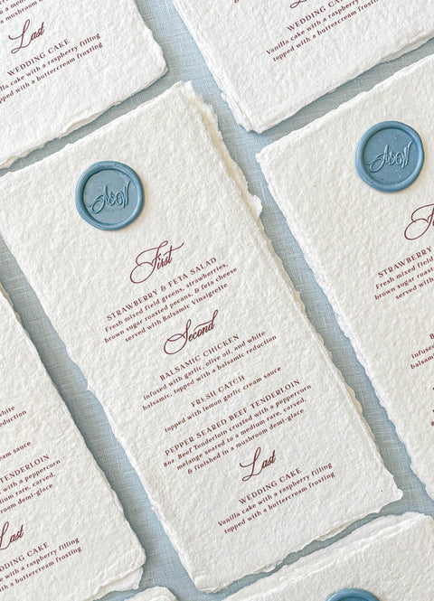 Celebrate refined simplicity with our handmade paper menus, designed for elegant weddings and fine-art gatherings. Each piece is made from luxury cotton paper with natural deckled edges and finished with a custom wax seal, offering a timeless and sophisticated touch. Perfect for romantic, classic, or European-inspired weddings, these menus add texture, character, and artisan craftsmanship to your table setting.