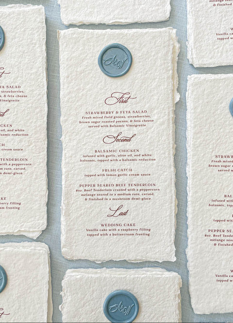 Celebrate refined simplicity with our handmade paper menus, designed for elegant weddings and fine-art gatherings. Each piece is made from luxury cotton paper with natural deckled edges and finished with a custom wax seal, offering a timeless and sophisticated touch. Perfect for romantic, classic, or European-inspired weddings, these menus add texture, character, and artisan craftsmanship to your table setting.