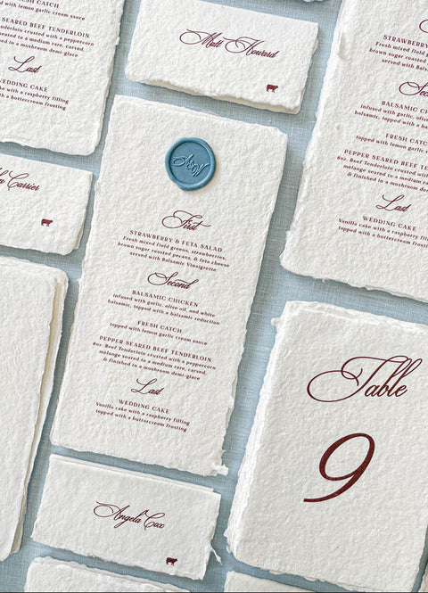 Celebrate refined simplicity with our handmade paper menus, designed for elegant weddings and fine-art gatherings. Each piece is made from luxury cotton paper with natural deckled edges and finished with a custom wax seal, offering a timeless and sophisticated touch. Perfect for romantic, classic, or European-inspired weddings, these menus add texture, character, and artisan craftsmanship to your table setting.