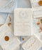 A serene and faith-inspired christening invitation crafted from luxurious handmade paper and adorned with soft watercolor botanicals. Featuring a delicate floral wreath and subtle Christian cross, this design blends timeless elegance with gentle color and refined typography. Perfect for baptisms and church ceremonies, it offers a meaningful keepsake that beautifully honors this sacred milestone.