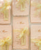 Bring warmth and romantic elegance to your tables with our colored handmade paper menus, crafted on premium cotton paper with softly deckled edges. Each piece features beautiful script typography, custom name tags, and silk-chiffon ribbons that add delicate texture and charm. Perfect for spring, garden, or fine-art weddings, these menus blend artisanal craftsmanship with graceful color palettes to complete your reception styling.