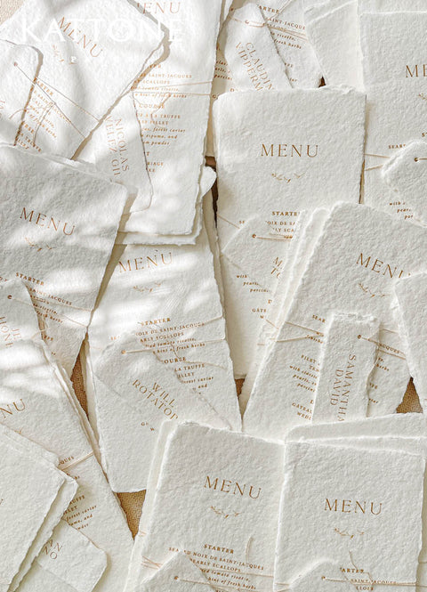Elevate your table styling with our handmade paper menus, beautifully crafted on 100% cotton paper with natural deckled edges. Each piece showcases refined typography and minimalist detailing, creating an effortless fine-art look. Perfect for romantic, luxury, or destination weddings, these menus add a bespoke touch of texture and authenticity to your reception tables - timeless heirlooms of modern elegance.