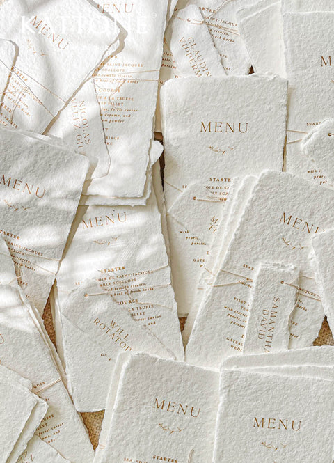 Elevate your table styling with our handmade paper menus, beautifully crafted on 100% cotton paper with natural deckled edges. Each piece showcases refined typography and minimalist detailing, creating an effortless fine-art look. Perfect for romantic, luxury, or destination weddings, these menus add a bespoke touch of texture and authenticity to your reception tables - timeless heirlooms of modern elegance.
