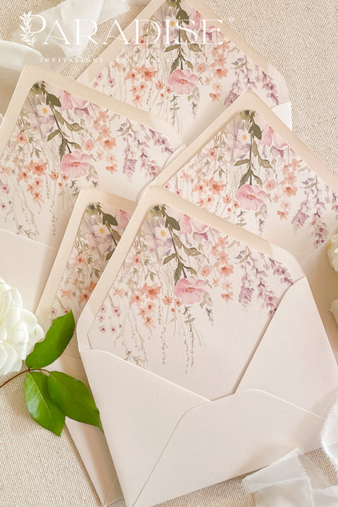 Luxury envelopes featuring watercolor floral liners arranged with floral details for romantic wedding invitations.