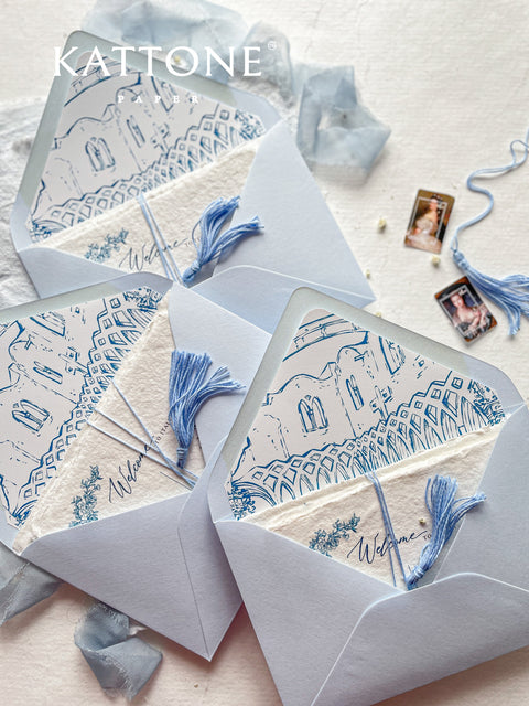Embrace bohemian charm and natural elegance with the Juliette boho rustic stationery sets. Each handmade wedding invitation is a beautiful work of art, featuring luxurious cotton rag paper with a romantic deckle edge. To complete the bohemian feel, every suite is embellished with a delicate tassel, creating a uniquely personal and tactile experience for your guests. The combination of rustic textures and charming details makes this collection perfect for a relaxed and romantic celebration.