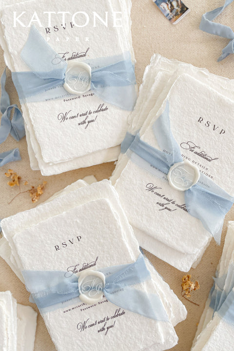 Announce your special day with understated elegance and personal charm. This earthen neutral wedding stationery collection is crafted to celebrate your love story with a refined, organic feel. Each invitation is a personalised handmade invite, featuring your unique details on our premium, artisan paper. The soft, neutral tones create a timeless and tranquil aesthetic, perfectly complemented by the gentle hue of the "Light Sky" accent color.