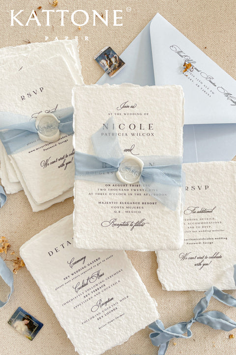 Announce your special day with understated elegance and personal charm. This earthen neutral wedding stationery collection is crafted to celebrate your love story with a refined, organic feel. Each invitation is a personalised handmade invite, featuring your unique details on our premium, artisan paper. The soft, neutral tones create a timeless and tranquil aesthetic, perfectly complemented by the gentle hue of the "Light Sky" accent color.