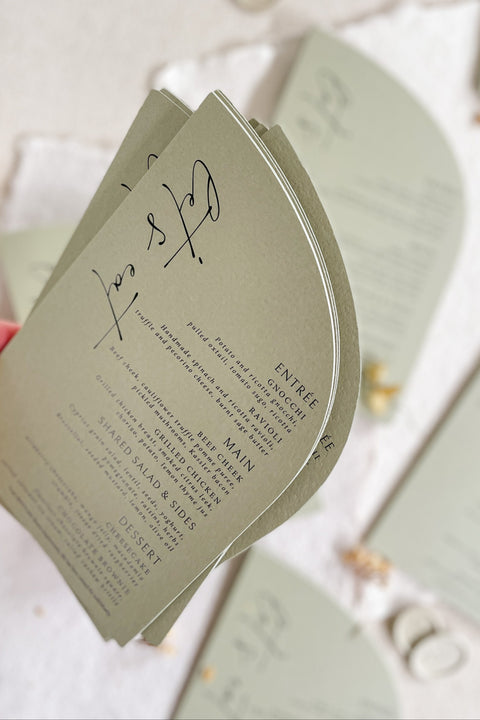 Add modern elegance to your tablescape with our sage green half arch wedding menus, thoughtfully designed for minimalist and fine-art celebrations. Printed on premium textured cardstock with sleek typography and organic curved edges, these menus bring a refined, nature-inspired touch to your event. Perfect for modern, botanical, and garden weddings, they elevate every setting with effortless sophistication.