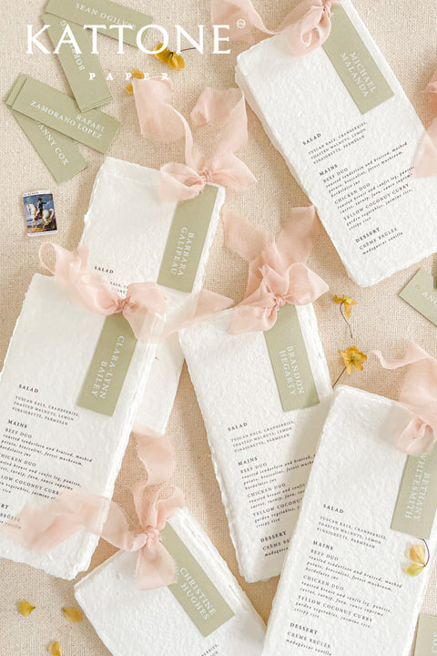 Introduce modern simplicity to your event with our place cards, crafted from premium cardstock in a soft sage color and printed with clean, contemporary typography. Their slim tag-style silhouette offers a fresh, minimalist look perfect for weddings, rehearsal dinners, corporate gatherings, or garden-inspired celebrations. These versatile cards can be displayed on napkins, tied with ribbon, or layered with menus for a refined and cohesive tablescape.