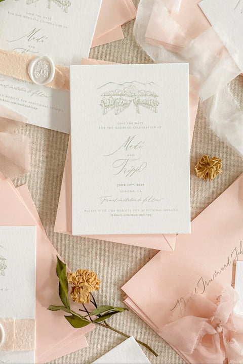 Announce your celebration with timeless elegance through our custom illustrated Save the Date cards, featuring a hand-drawn watercolor or line sketch of your wedding venue. Each card is printed on premium textured cotton paper and paired with soft blush envelopes, vellum wraps, and a white wax seal, creating a refined and romantic presentation.