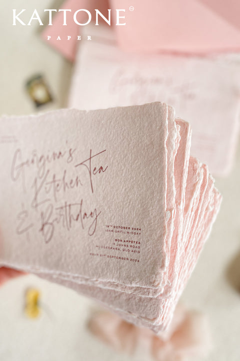 Colored handmade paper bridal shower invitations bring a soft, romantic warmth to your celebration. Crafted from artisan paper with beautifully deckled edges, each invitation features a gentle blush tone and modern handwritten-style typography for an effortlessly elegant look. The tactile texture and subtle color elevate the design, making these invitations perfect for bridal showers, garden parties, tea celebrations, and feminine gatherings that feel both personal and refined.