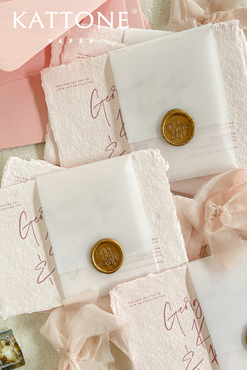 Colored handmade paper bridal shower invitations bring a soft, romantic warmth to your celebration. Crafted from artisan paper with beautifully deckled edges, each invitation features a gentle blush tone and modern handwritten-style typography for an effortlessly elegant look. The tactile texture and subtle color elevate the design, making these invitations perfect for bridal showers, garden parties, tea celebrations, and feminine gatherings that feel both personal and refined.