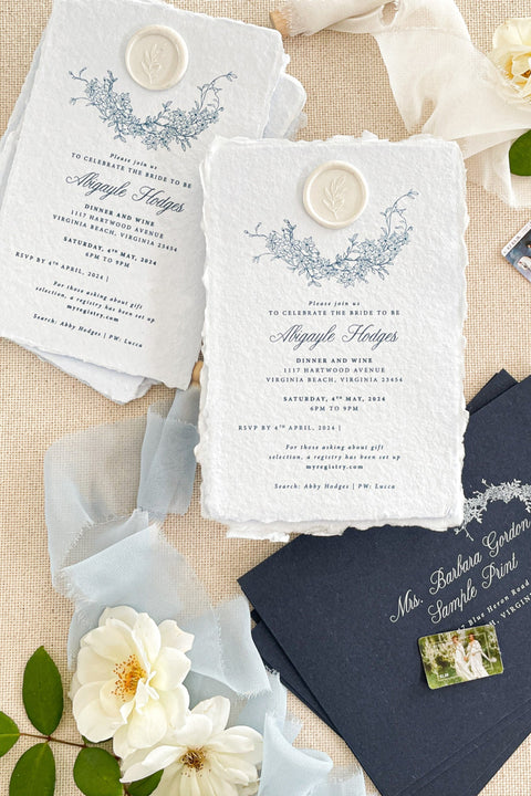 Celebrate the bride-to-be with handmade paper bridal shower invitations that feel as meaningful as the occasion itself. Crafted from luxurious cotton paper with softly deckled edges, these invitations showcase delicate fine-art typography and botanical detailing for a timeless, romantic presentation. Designed to elevate intimate gatherings and refined celebrations, they offer an heirloom-quality keepsake that sets the tone for a beautifully curated bridal shower.