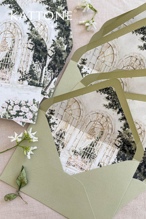Coordinated wedding envelopes with custom venue illustration liners in a soft green and neutral palette, designed for elegant weddings.