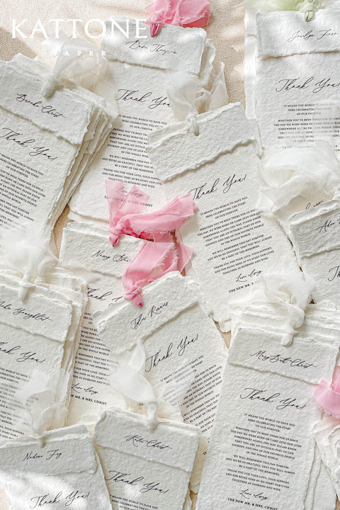 Designed to turn gratitude into a keepsake, these handmade paper thank you cards are crafted from richly textured cotton paper with soft deckled edges. Each card carries an organic, heirloom quality that feels personal and intentional, enhanced by elegant calligraphy and delicate ribbon accents. Perfect for weddings, baptisms, christenings, and refined celebrations, they offer a timeless way to share heartfelt thanks while elevating your stationery suite with artisanal charm.