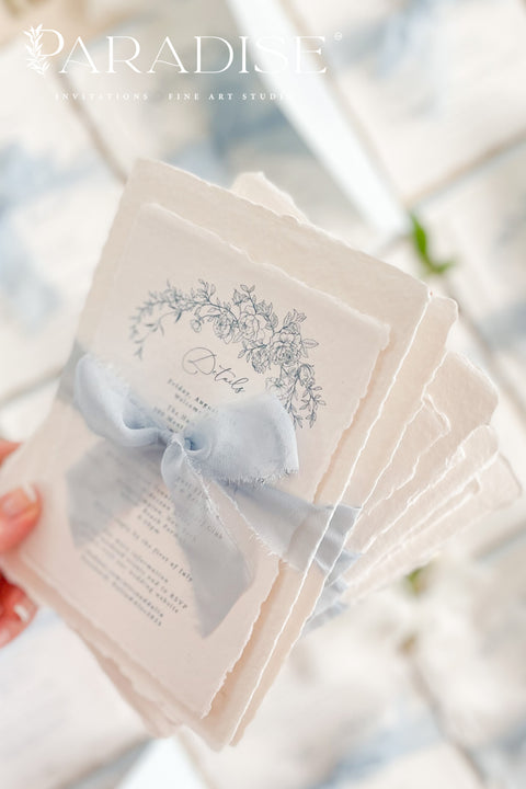 Announce your special day with timeless, heartfelt style. This botanical wedding invitation suite is crafted on our signature, luxurious handmade paper, made from 100% recycled cotton rag. The unique deckled edges and soft texture provide an artisan feel that is both rustic and elegant, setting a deeply romantic tone for your ceremony. Featuring delicate botanical illustrations, each invite is an eco-friendly choice that leaves a lasting impression on your guests.