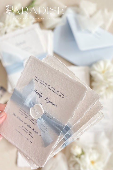Elegant, romantic, and handmade with love - our fine art wedding invitation suite is crafted from luxury cotton deckled-edge paper and finished with a delicate powder blue chiffon ribbon and white wax seal. The soft blue tones and artisanal textures make this suite perfect for fine art, coastal, or destination weddings, offering a serene yet refined aesthetic that feels effortlessly graceful.