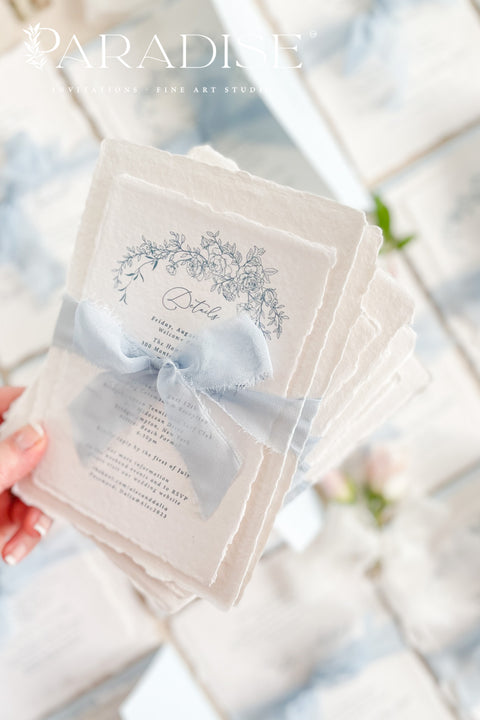 Announce your special day with timeless, heartfelt style. This botanical wedding invitation suite is crafted on our signature, luxurious handmade paper, made from 100% recycled cotton rag. The unique deckled edges and soft texture provide an artisan feel that is both rustic and elegant, setting a deeply romantic tone for your ceremony. Featuring delicate botanical illustrations, each invite is an eco-friendly choice that leaves a lasting impression on your guests.