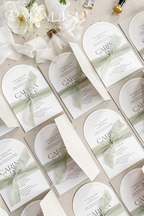 Our arched wedding invitation suite is perfect for couples seeking a modern yet romantic stationery style. The smooth arch shape brings a contemporary edge, while the sage green silk ribbon adds a soft, botanical touch. Printed on premium white matte cardstock, this suite features clean, modern typography and delicate detailing that beautifully complements any wedding theme - from garden to destination to modern minimalist celebrations.