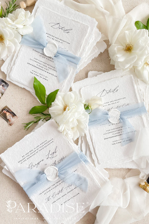 This exquisite invitation sets suite offers a blend of modern sophistication and natural beauty. Perfect for a beach wedding, these personalised invites feature a stunning, modern clean calligraphy design printed on luxurious handmade cotton paper. The tactile, rich feel of the paper beautifully complements the elegant and contemporary typography, setting a fresh and personal tone for your special day.