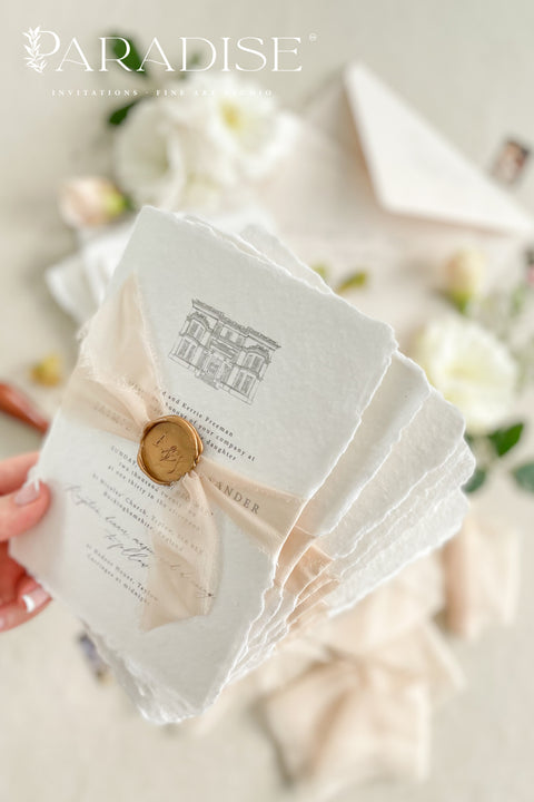 Announce your special day with a timeless and deeply personal touch with these exquisite wedding invitations. Each invite is a beautiful work of art, featuring a bespoke wedding venue illustration, hand-drawn by us to capture the unique charm of your location. Printed on luxurious handmade paper, this suite offers a rich, tactile experience and a classy and elegant stationery design that your guests will cherish.